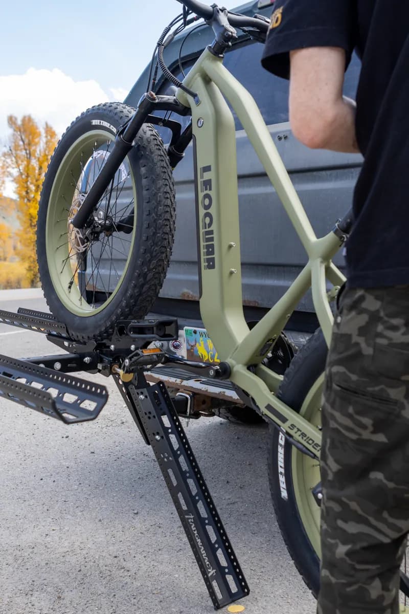 E-bike wheel rolling onto the RadGnaRack ramp